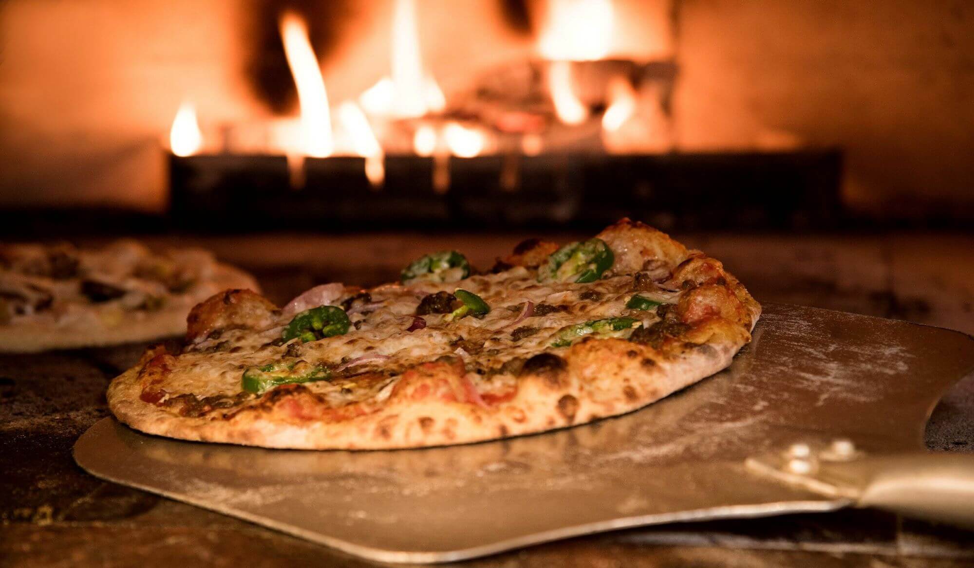 Restaurant website door Tijdvooreensite voor pizzeria Caruso